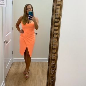 Tangerine dress. Purchased from high end boutique in SC for pageant. Worn once.